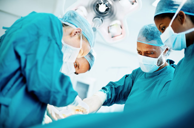 stock photo of doctors performing surgery